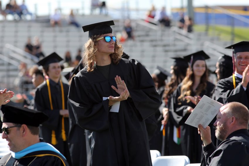 Hunter Cameron applauds his teachers at the Pomona High graduation.